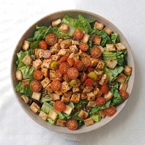 Spicy Buffalo Chicken Salad with Mixed Seeds & Toasted Pita